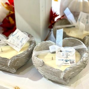 Heart shaped concrete angel wing candle.
